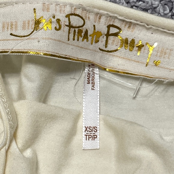 NWOT Jen’s Pirate Booty XS cream tank top. Adjustable straps.Small stain on back - Picture 1 of 8
